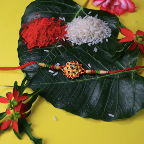 Flower Design Rakhi – Elegant Floral Designer Rakhi for Brother