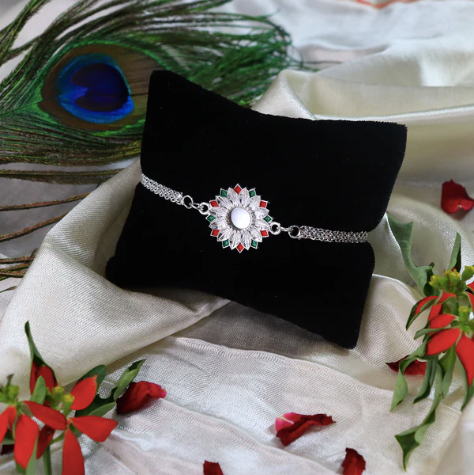 Silver Meenakari Floral Rakhi – Elegant Designer Rakhi for Brother