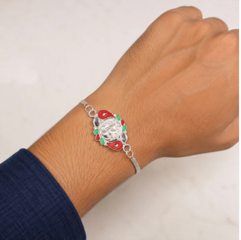 Ganesha Rakhi with Elegant Silver Finish – Premium Designer Rakhi for Brother