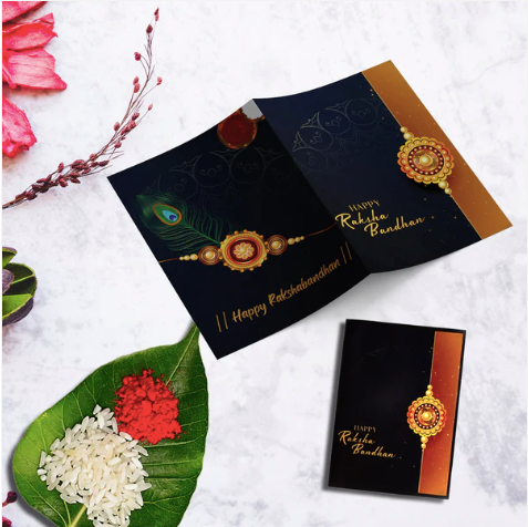 Rakhi Combo Gift Set – 2 Designer Rakhis with Silver Coin, Roli Chawal & Chocolate