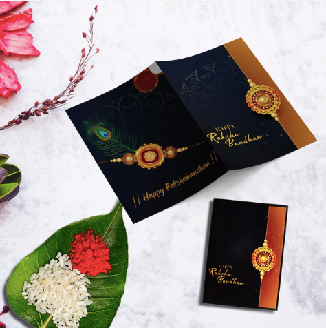 Silver Rakhi Gift Set – 2 Designer Rakhis with Pooja Thali, Silver Coin & Chocolate