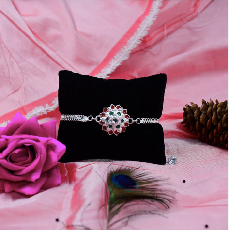 Silver Chain Rakhi with Red & Green Accents – Premium Designer Rakhi for Brother