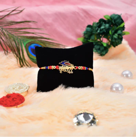 Krishna Name Rakhi – Divine Golden Designer Rakhi for Brother