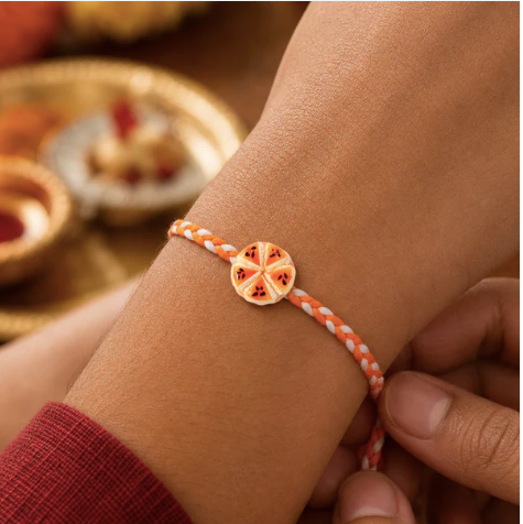 Orange Slice Charm Designer Rakhi – Cute Fancy Dori Rakhi for Brother