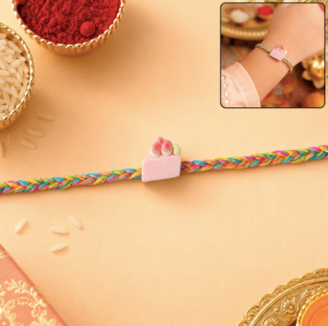 Strawberry Cake Charm Designer Rakhi – Cute Fancy Dori Rakhi for Brother