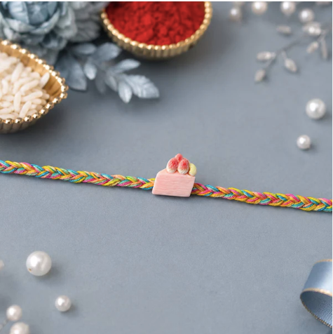 Strawberry Cake Charm Designer Rakhi – Cute Fancy Dori Rakhi for Brother