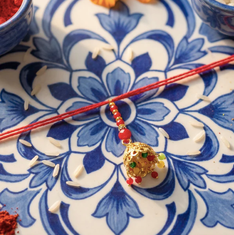 Om Charm Bhabhi Rakhi with Jhumka Latkan – Premium Traditional Lumba Rakhi for Raksha Bandhan