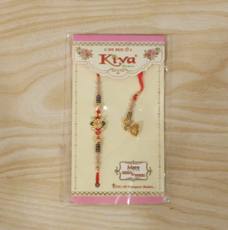 Premium Floral Pearl Bhabhi Lumba Rakhi with Golden Latkan – Elegant Designer Rakhi for Raksha Bandhan