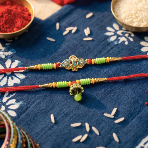 Premium Om Peacock Bhabhi Lumba Rakhi – Handcrafted Traditional Designer Rakhi with Multicolor Beads