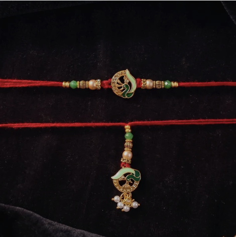 Premium Peacock Stone Bhabhi Lumba Rakhi – Handcrafted Designer Rakhi with Pearl Drop & Traditional Peacock Charm