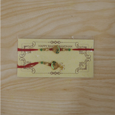 Premium Peacock Stone Bhabhi Lumba Rakhi – Handcrafted Designer Rakhi with Pearl Drop & Traditional Peacock Charm