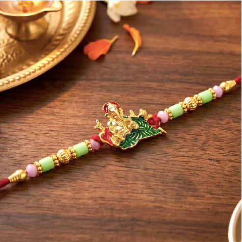 Ganesha Rakhi with Leaf Design – Traditional Designer Rakhi for Brother