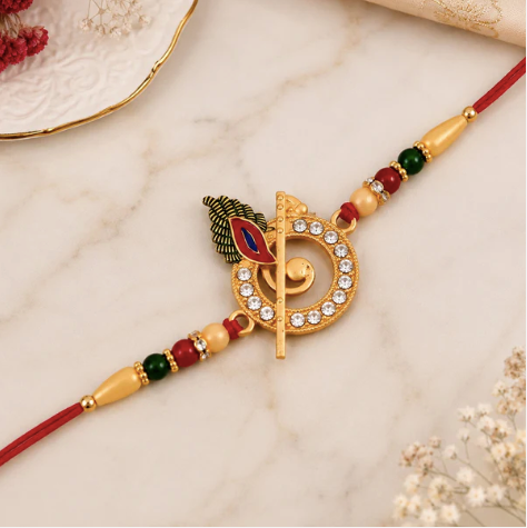 Premium Krishna Flute Rakhi – Stone Studded Peacock Feather Designer Rakhi for Brother | Divine Raksha Bandhan Special