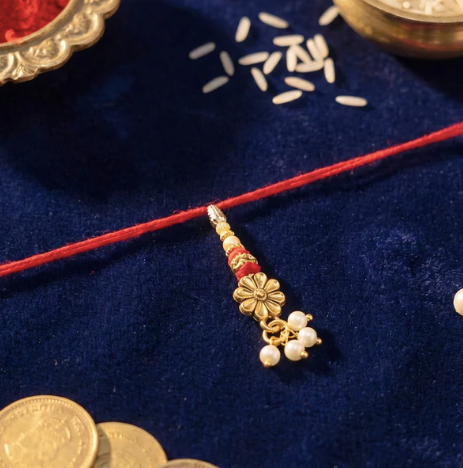 Bhabhi Rakhi – Elegant Floral Pearl Drop Lumba Rakhi for Raksha Bandhan