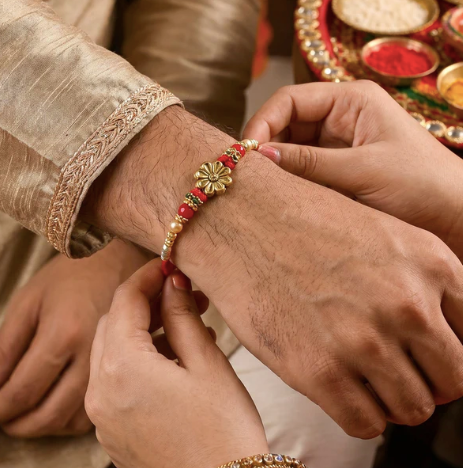 Bhabhi Rakhi – Elegant Floral Pearl Drop Lumba Rakhi for Raksha Bandhan